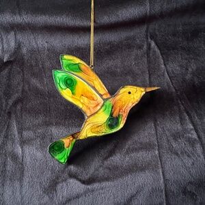 Humming Bird, mosaic ornament, yellow and green.